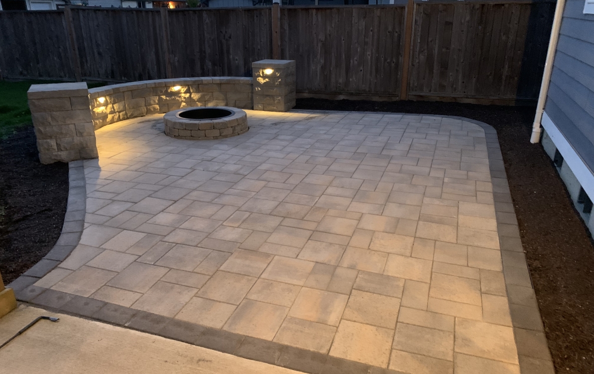 Paver patio and fire pit seating area