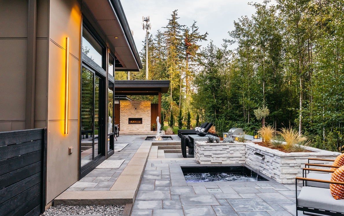 Water features, Outdoor Kitchen, Fiberglass Spa, Pavers, Landscape Lighting, Artificial Turf