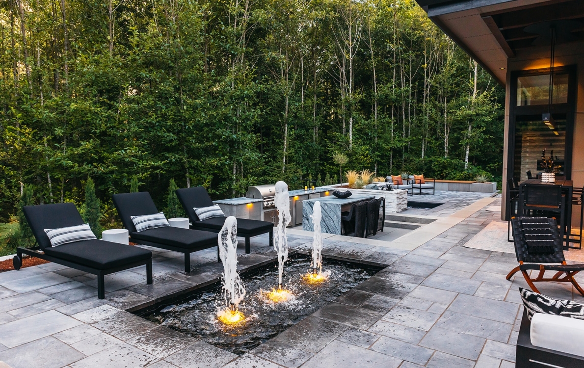 Water features, Outdoor Kitchen, Fiberglass Spa, Pavers, Landscape Lighting, Artificial Turf