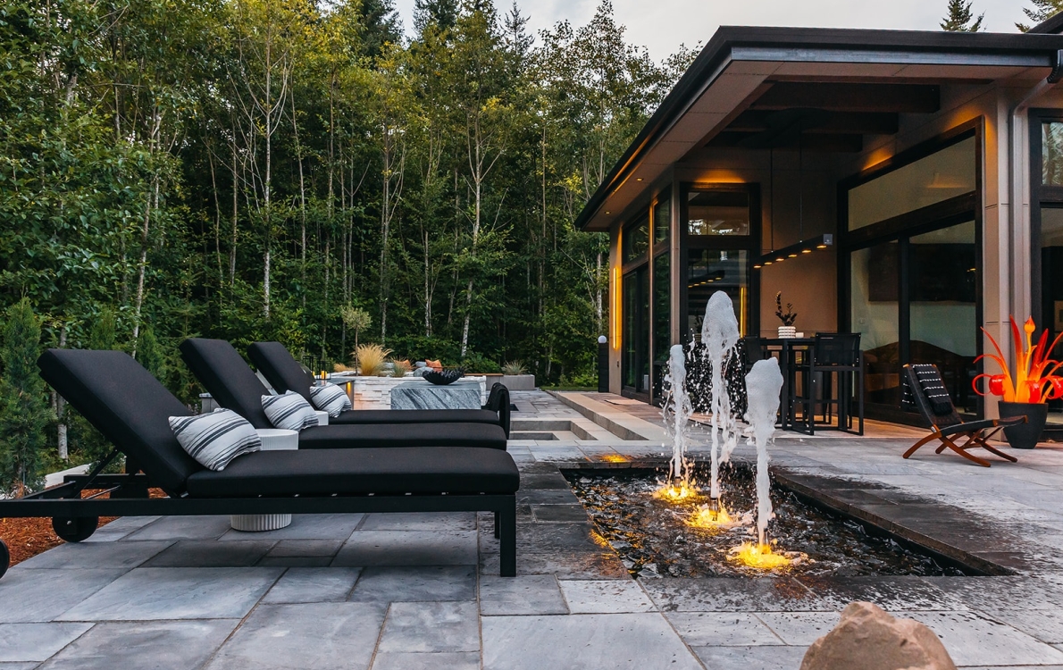 Water features, Outdoor Kitchen, Fiberglass Spa, Pavers, Landscape Lighting, Artificial Turf