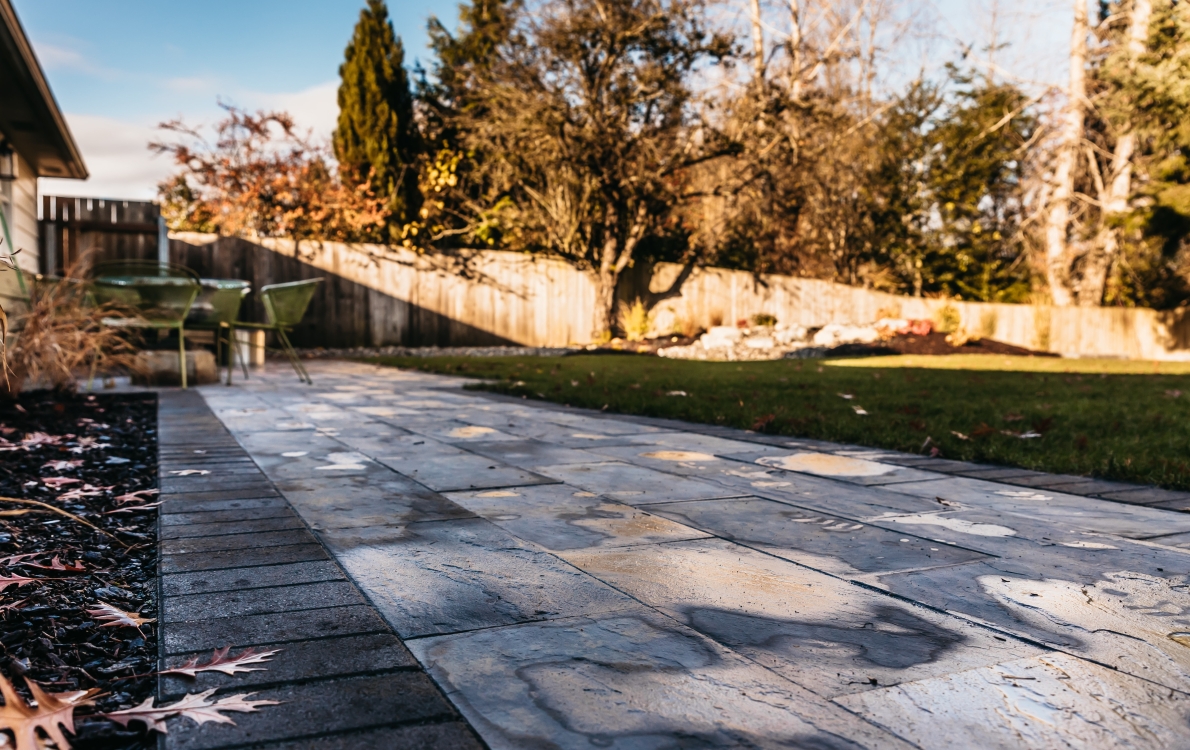 landscaping and paver patio backyard