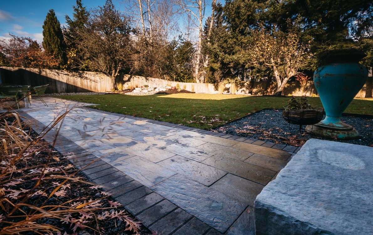 landscaping and paver patio backyard