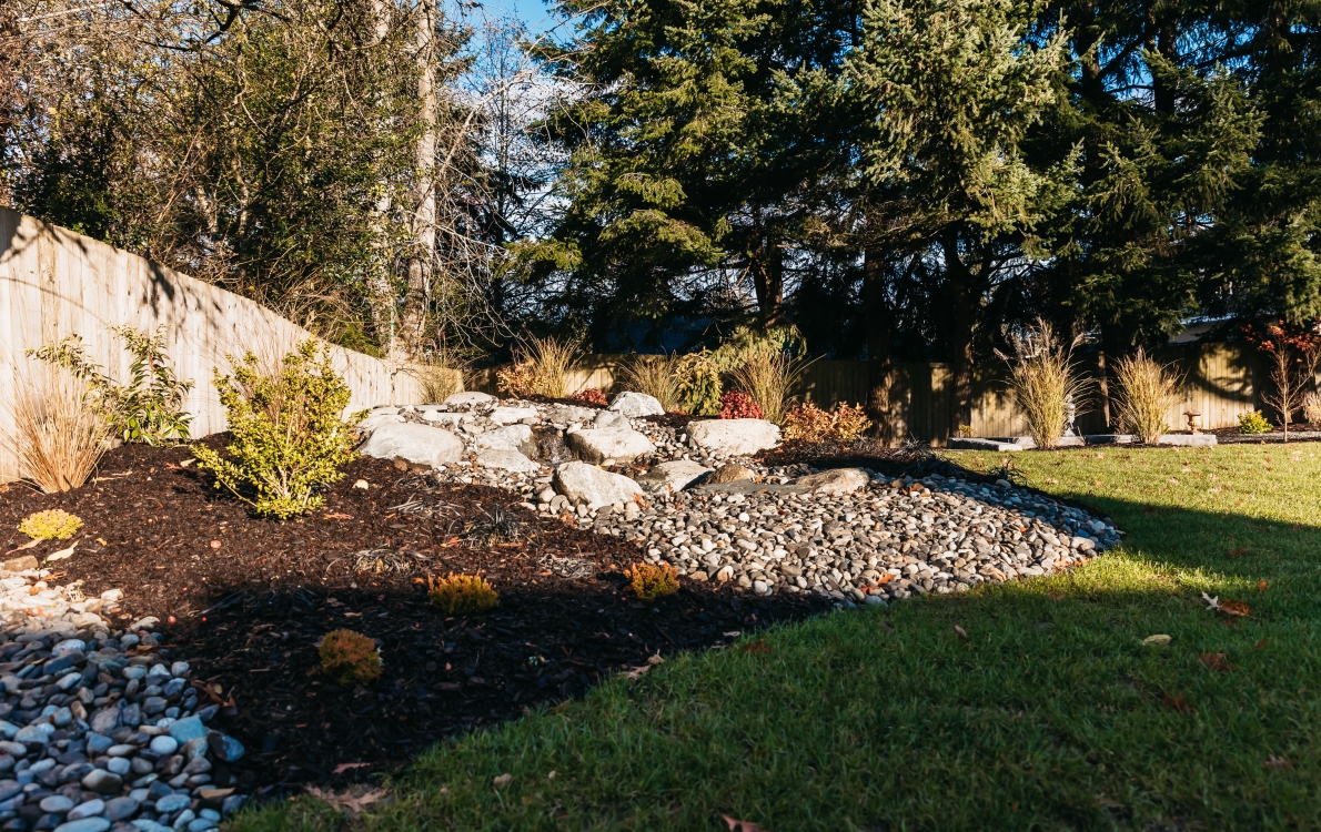 landscaping and paver patio backyard