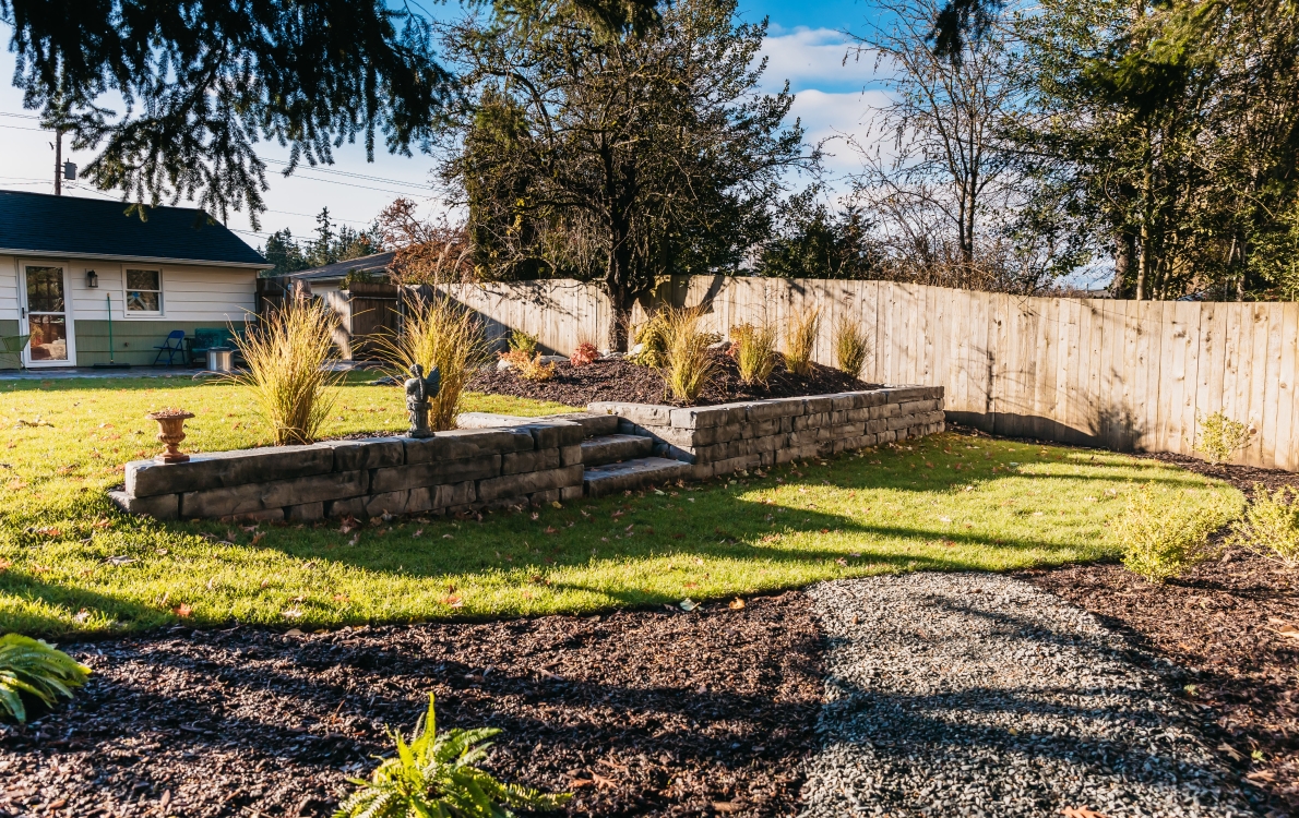 landscaping and paver patio backyard
